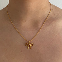 Load image into Gallery viewer, Gold plated small ruby bow necklace
