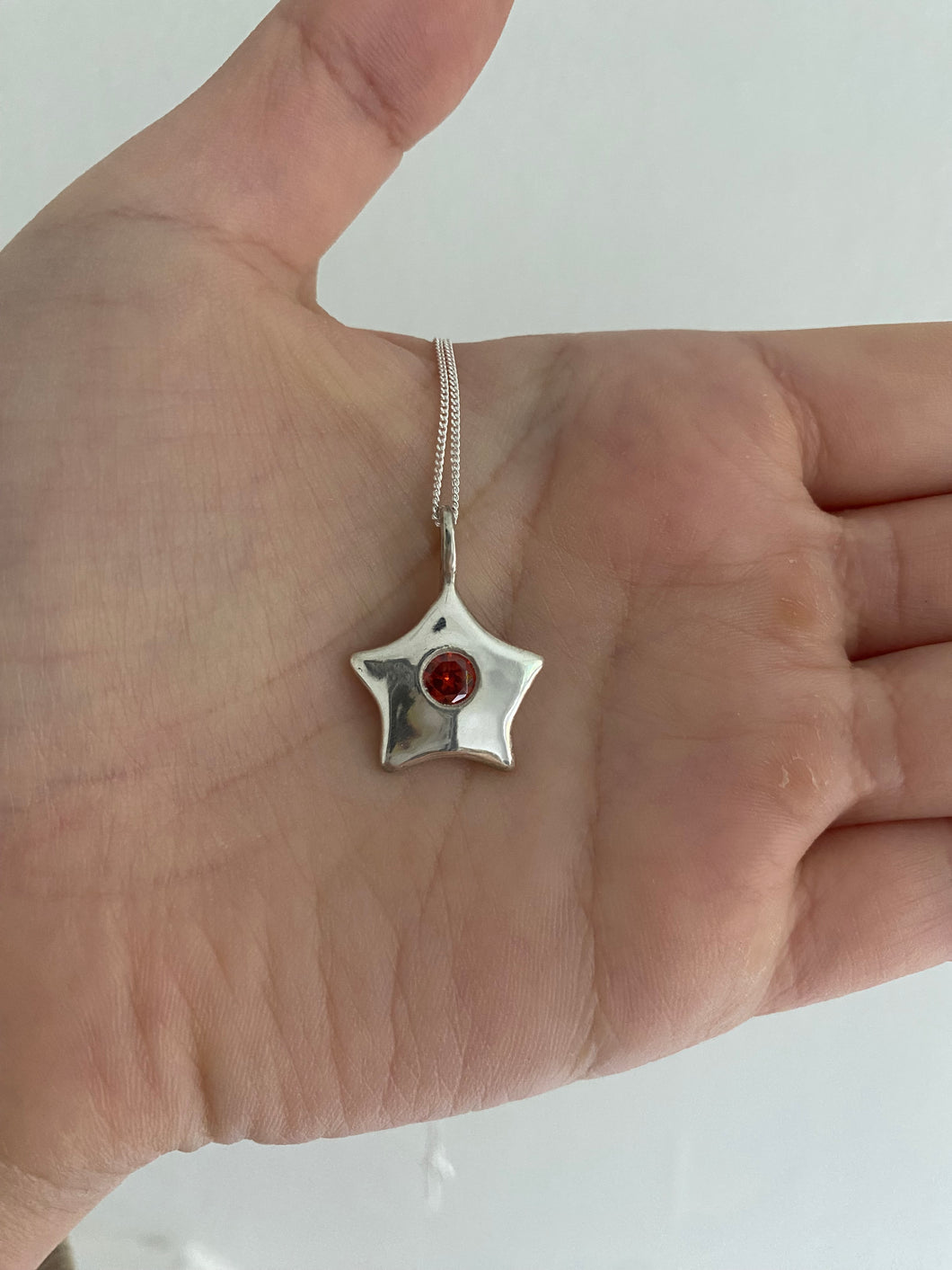 Garnet star necklace