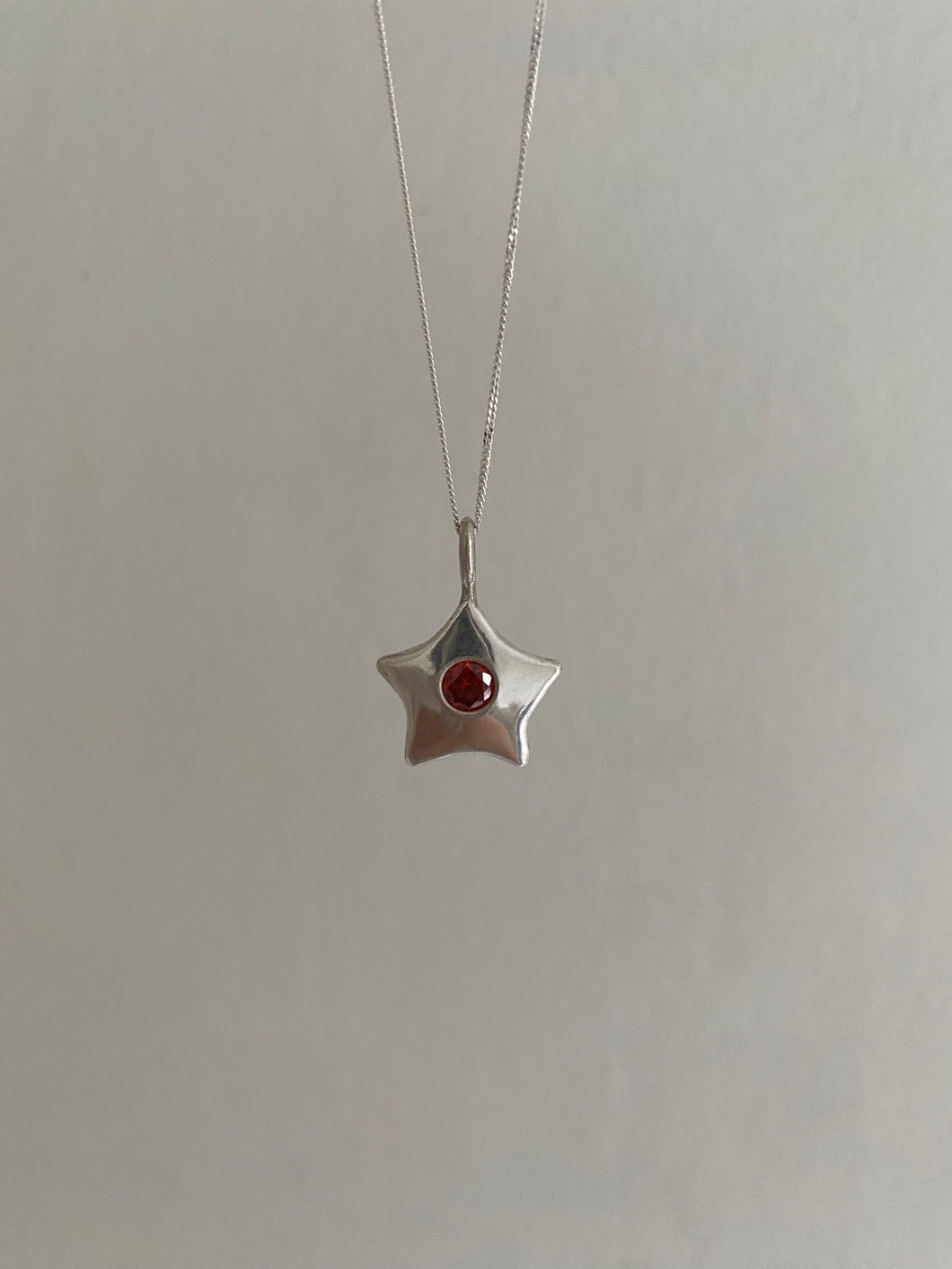 red garnet star necklace