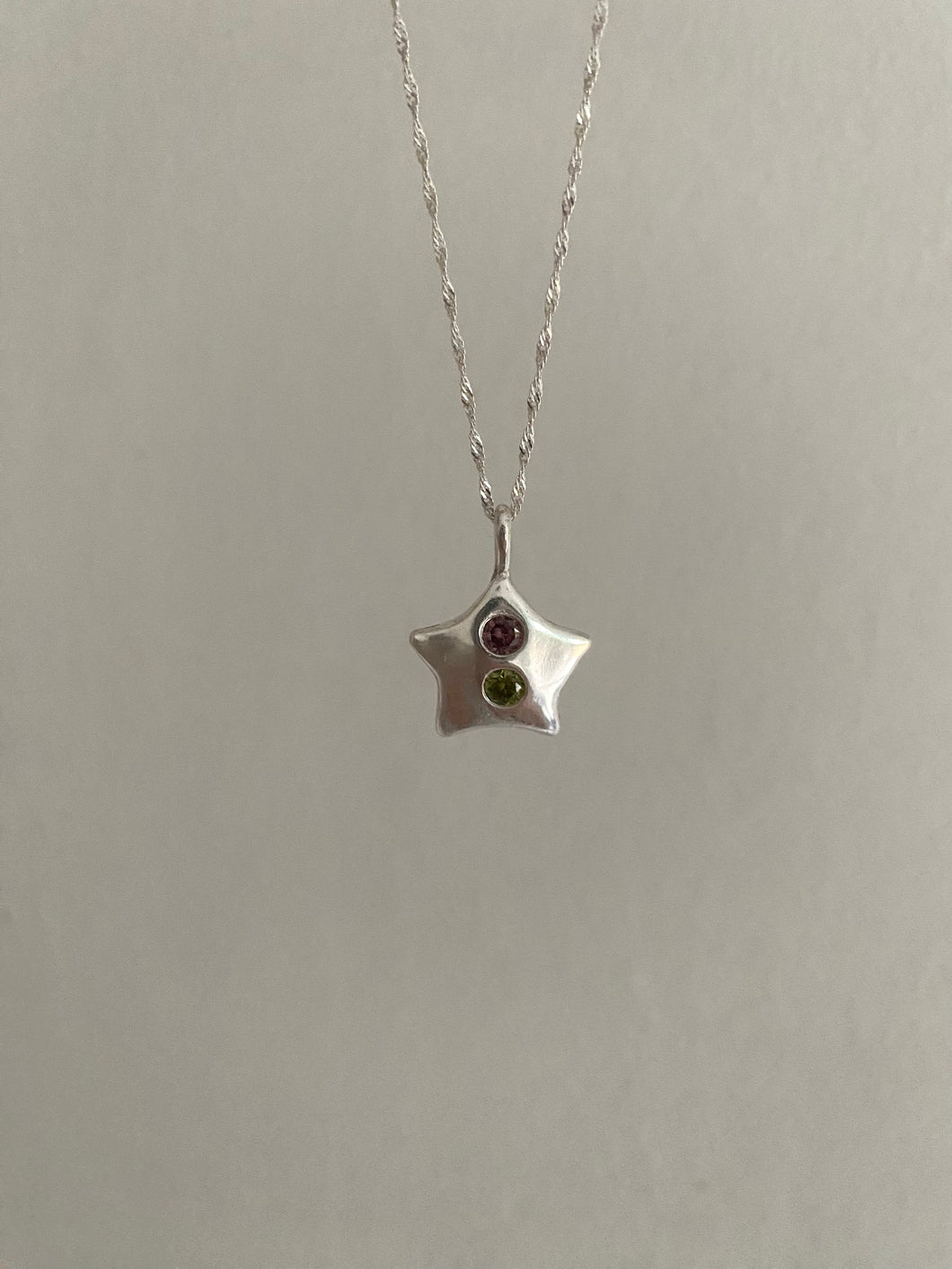 pink and green star necklace